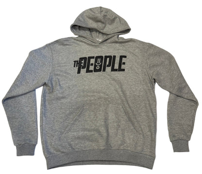 Gray hoodie with 'The People' text on a white surface