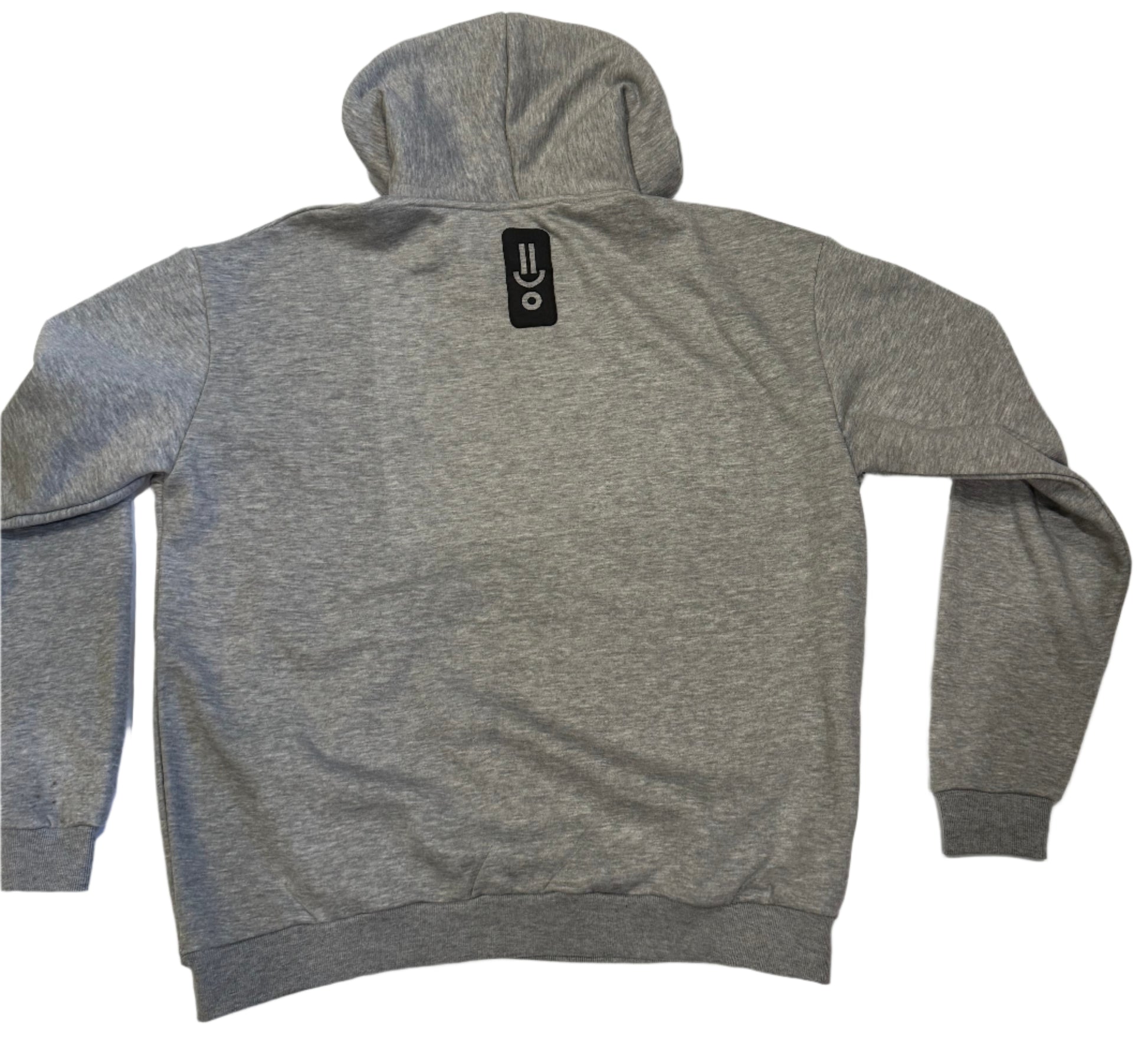 Gray sweatshirt with a brand logo on a white surface