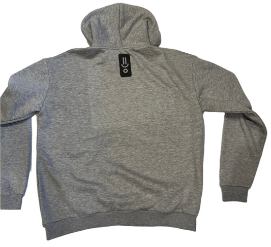Gray sweatshirt with a brand logo on a white surface